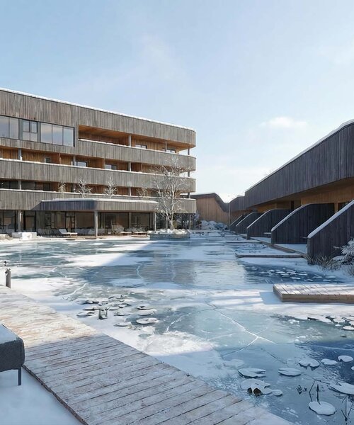TheGreen-Visualisierung-Aussenaufnahme-Winter-1 Moderner Gebäudekomplex mit Holzfassaden und gefrorenem Teich im Vordergrund bei winterlicher Landschaft