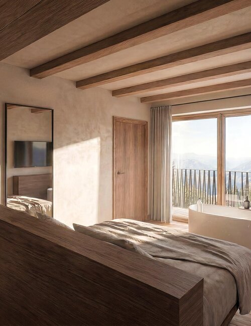 Schlafzimmer mit großem Bett, Holzwänden und -boden, Zugang zu Balkon mit Sitzmöbeln